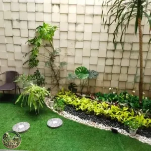 Foto hasil kerja Pembuatan Taman dengan Karpet Sintetis